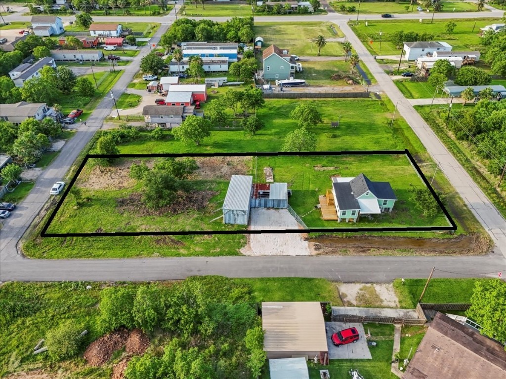 246 18th Street San Leon, TX 77539 - Photo 16 of 20 a view of swimming pool with a yard