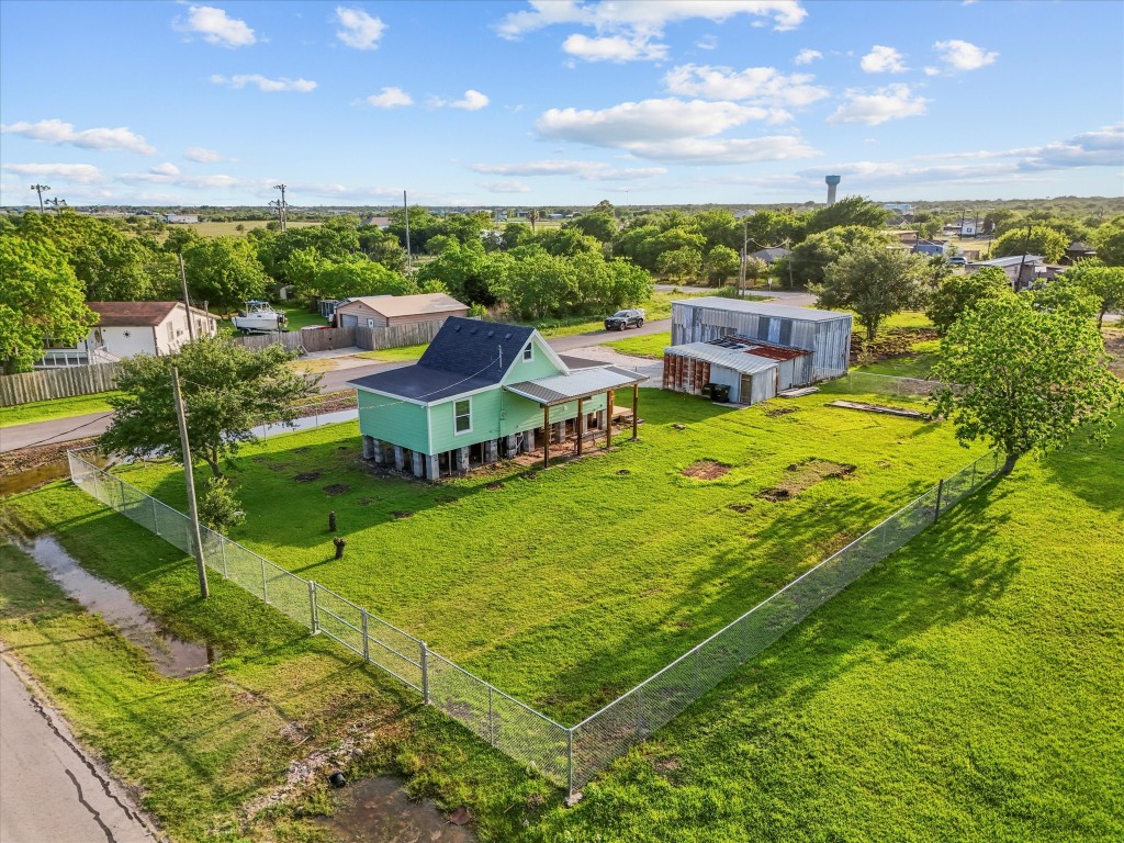 246 18th Street San Leon, TX 77539 - Photo 18 of 20 a view of a swimming pool with a yard
