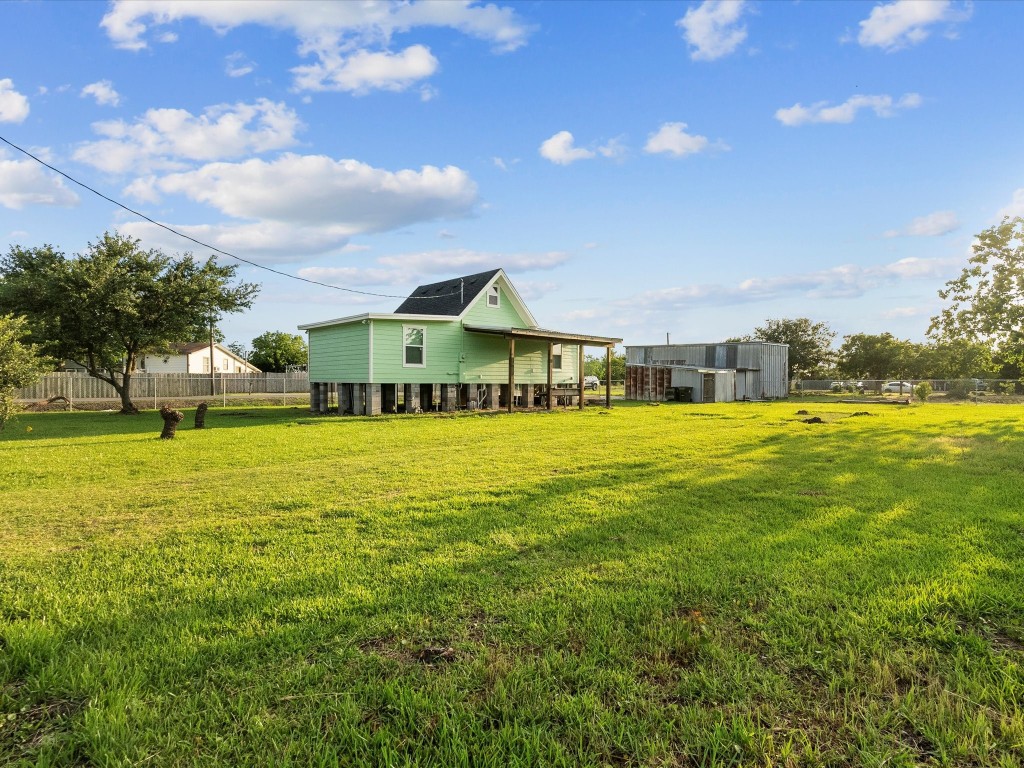 246 18th Street San Leon, TX 77539 - Photo 19 of 20 a view of an ocean with a big yard and large trees