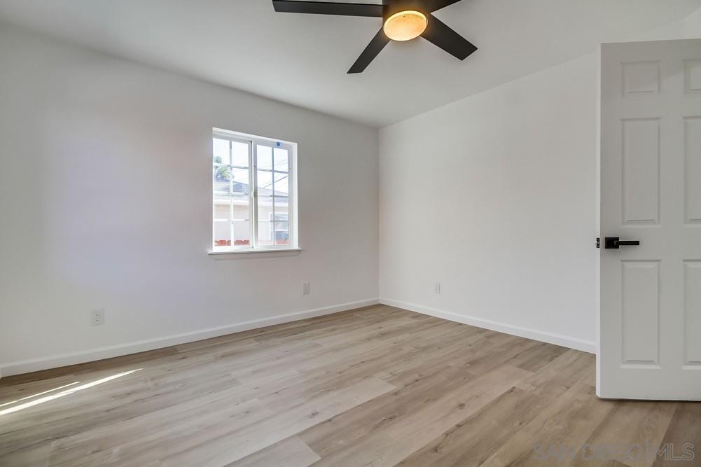 796 West Washington Avenue El Cajon, CA 92020 - Photo 19 of 71 wooden floor in an empty room with a window