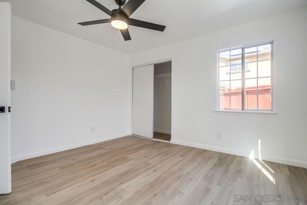 796 West Washington Avenue El Cajon, CA 92020 - Photo 20 of 71 wooden floor in an empty room with a window