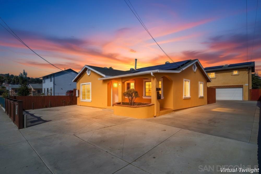 796 West Washington Avenue El Cajon, CA 92020 - Photo 2 of 71 a view of house with backyard and parking
