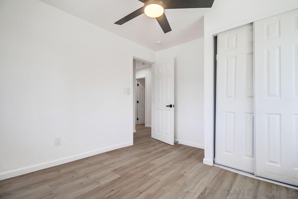 796 West Washington Avenue El Cajon, CA 92020 - Photo 23 of 71 a view of an empty room with wooden floor