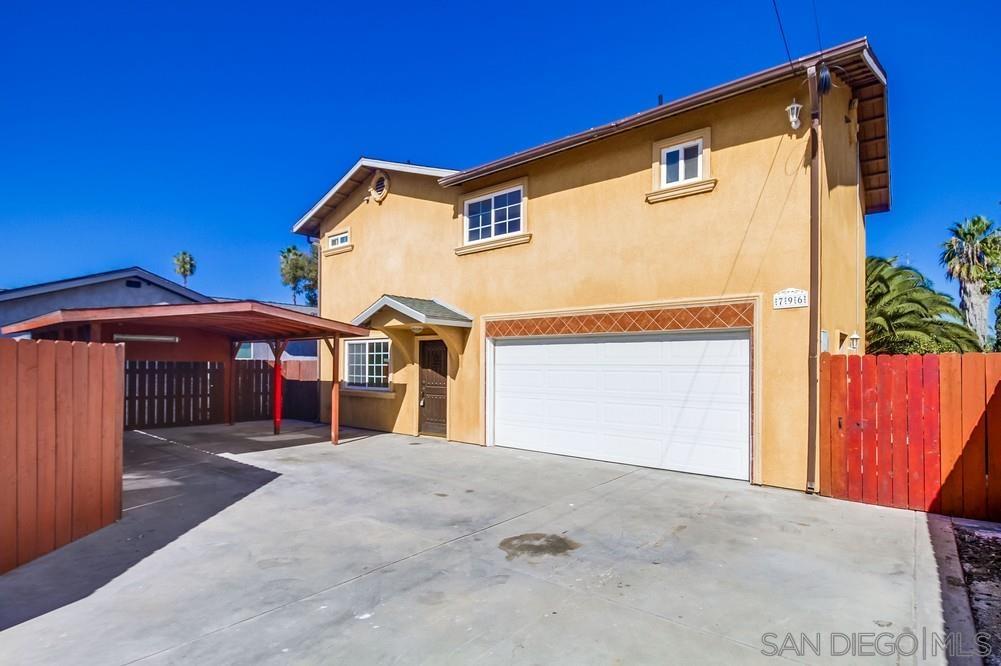 796 West Washington Avenue El Cajon, CA 92020 - Photo 30 of 71 a front view of a house with a garage