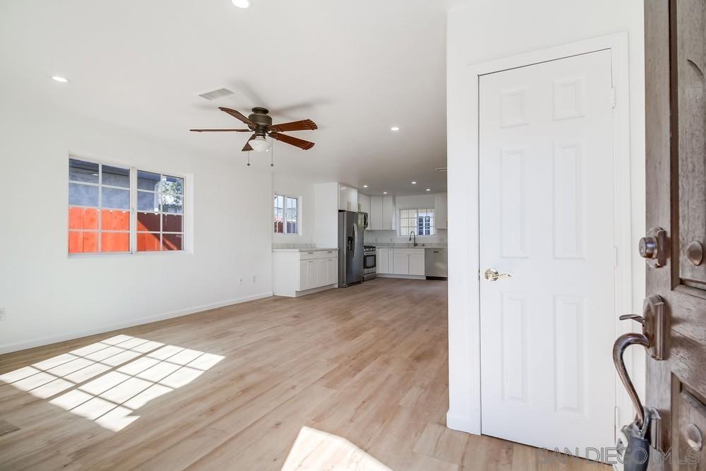 796 West Washington Avenue El Cajon, CA 92020 - Photo 35 of 71 a view of workspace with wooden floor and a window