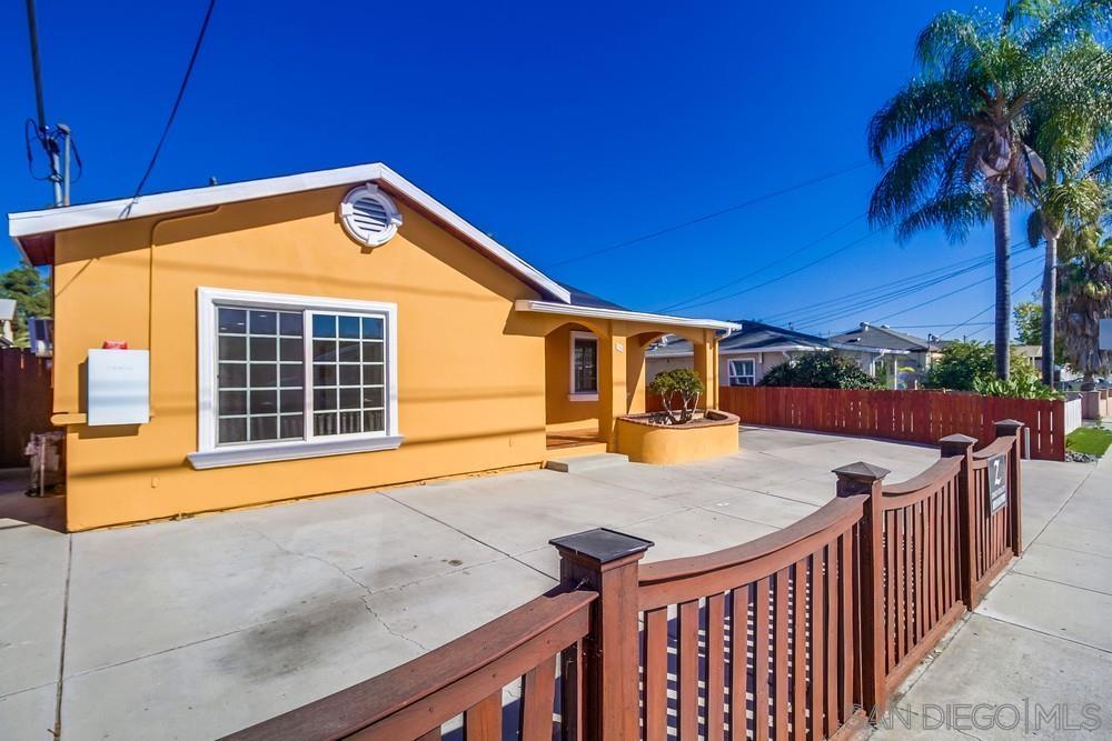 796 West Washington Avenue El Cajon, CA 92020 - Photo 4 of 71 a view of a house with a swimming pool