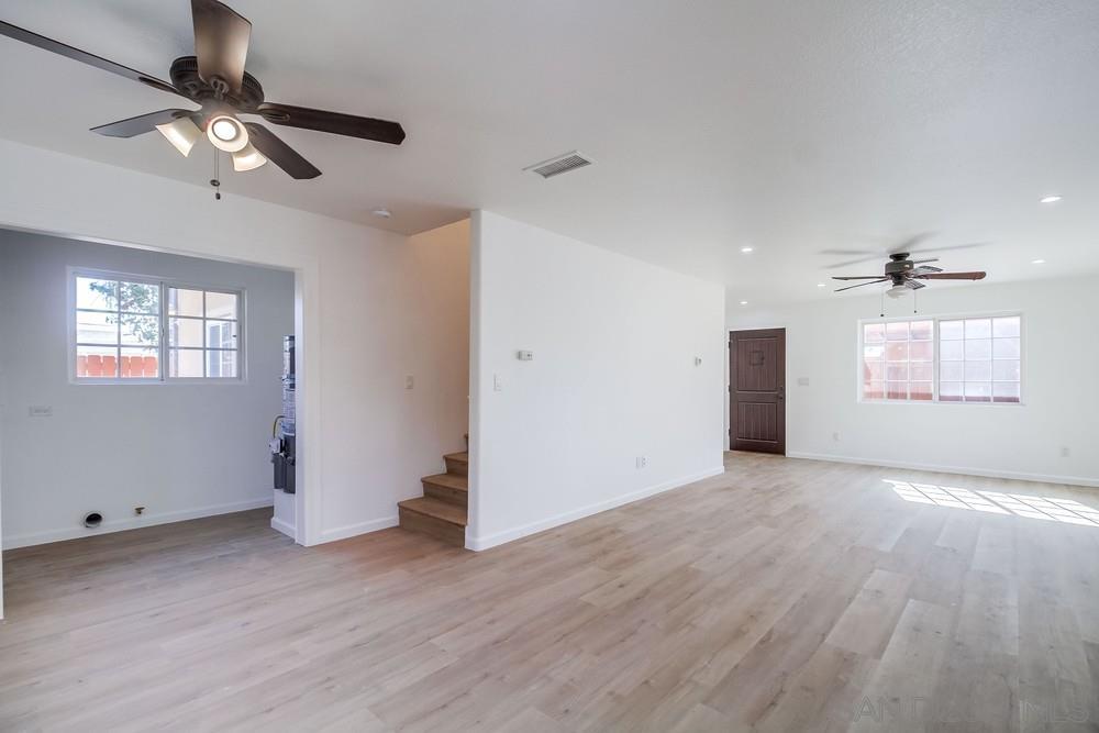 796 West Washington Avenue El Cajon, CA 92020 - Photo 42 of 71 a view of an empty room with wooden floor and a window