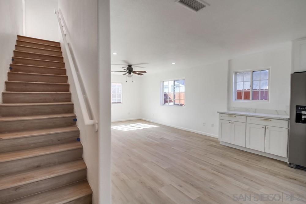 796 West Washington Avenue El Cajon, CA 92020 - Photo 45 of 71 a view of an entryway with wooden floor and staircase