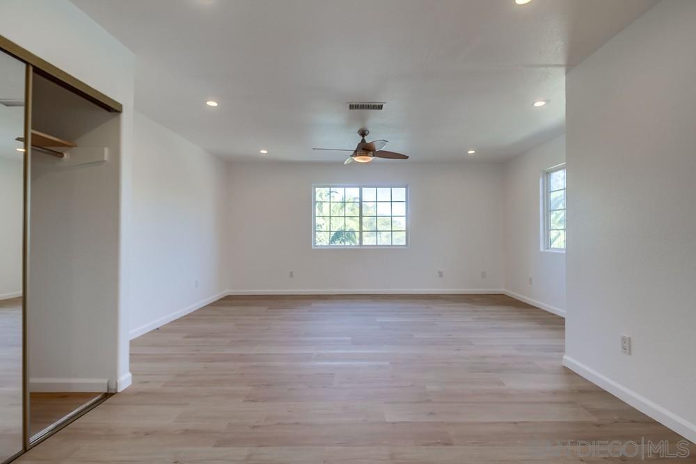 796 West Washington Avenue El Cajon, CA 92020 - Photo 47 of 71 wooden floor in an empty room with a window