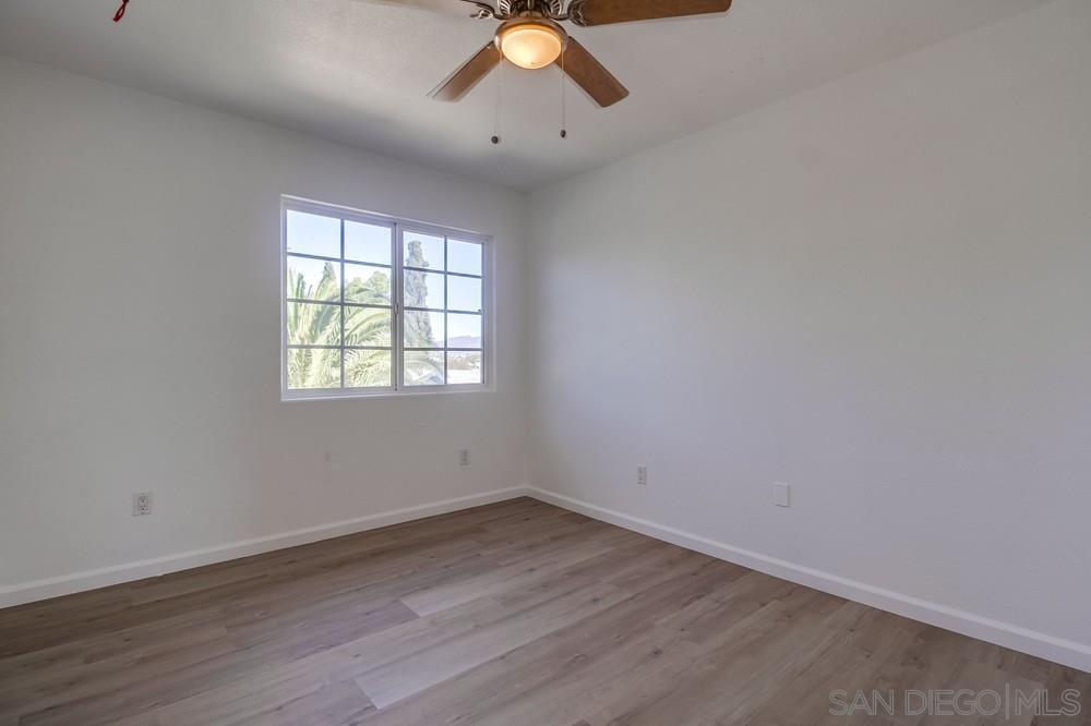 796 West Washington Avenue El Cajon, CA 92020 - Photo 60 of 71 wooden floor in an empty room with a window