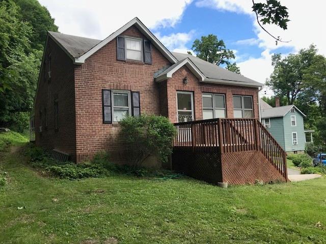 366 Angola Road Cornwall, NY 12518 - Photo 1 of 1 a view of a house with brick walls and a yard with plants