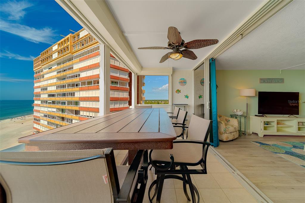 17920 Gulf Boulevard, Unit 1205 Redington Shores, FL 33708 - Photo 19 of 67 a view of a livingroom with furniture and a flat screen tv