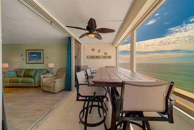 a front view of a house with garage and yard