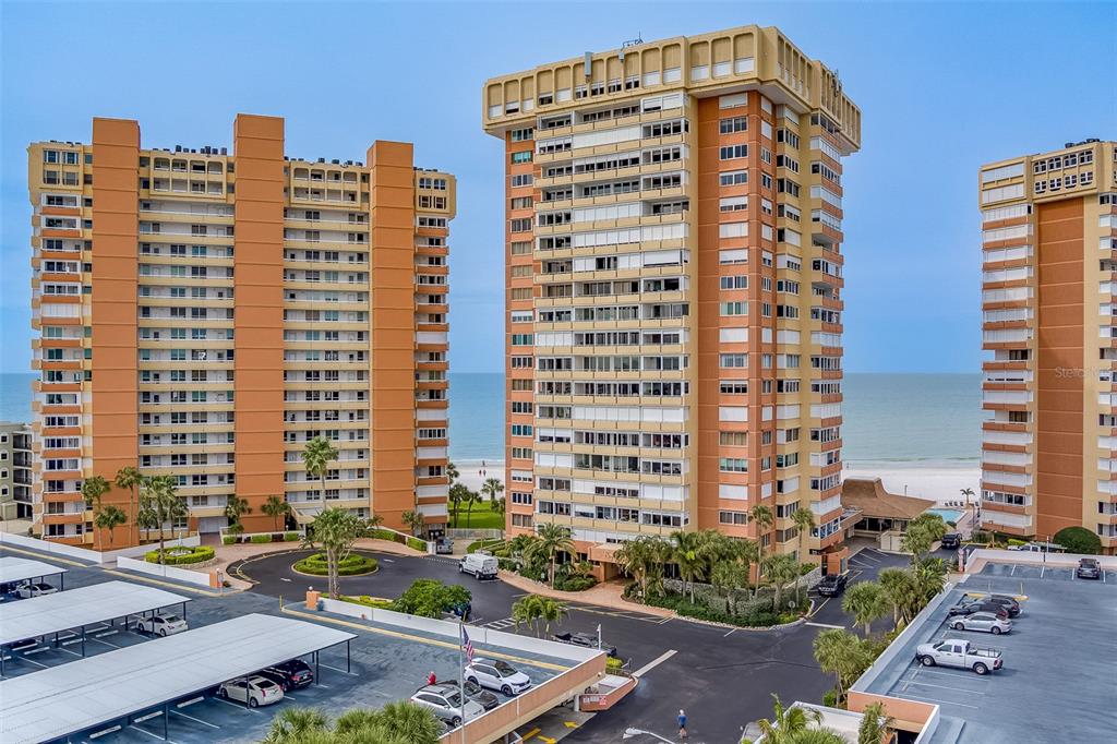 17920 Gulf Boulevard, Unit 1205 Redington Shores, FL 33708 - Photo 65 of 67 a front view of a building with a street view