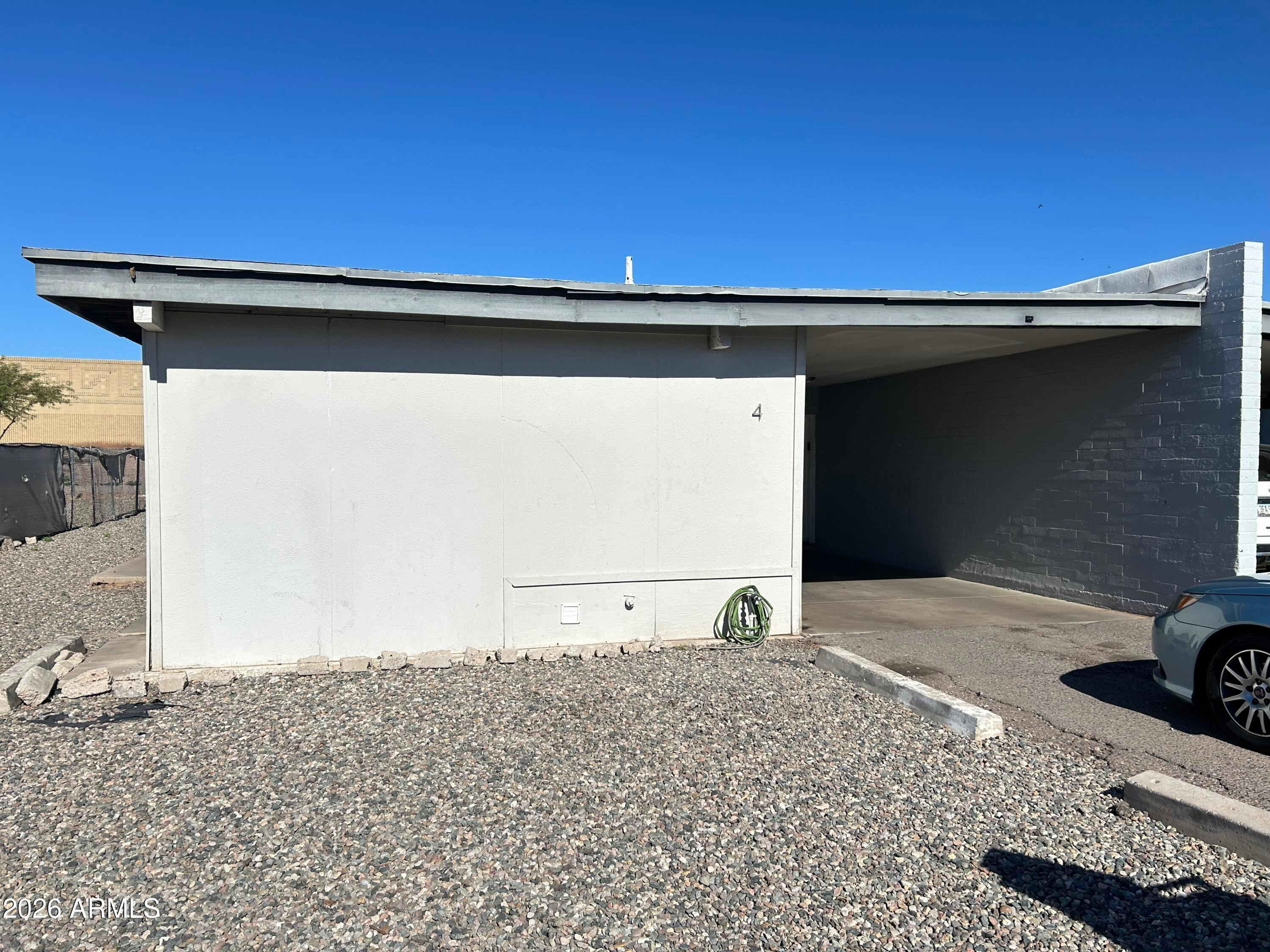 1124 North 27th Street, Unit 4 Phoenix, AZ 85008 - Photo 1 of 9 a view of parking area