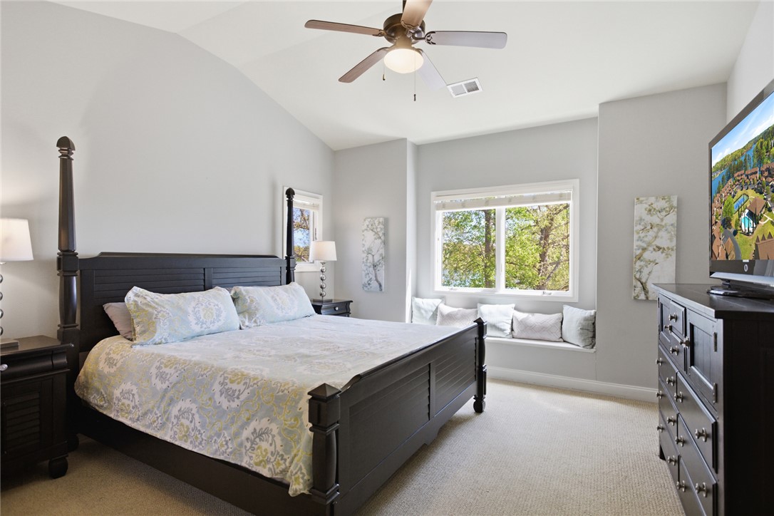 578 Sunset Point Drive West Union, SC 29696 - Photo 19 of 46 This restful bedroom offers serene comfort with verdant outdoor views and natural light.