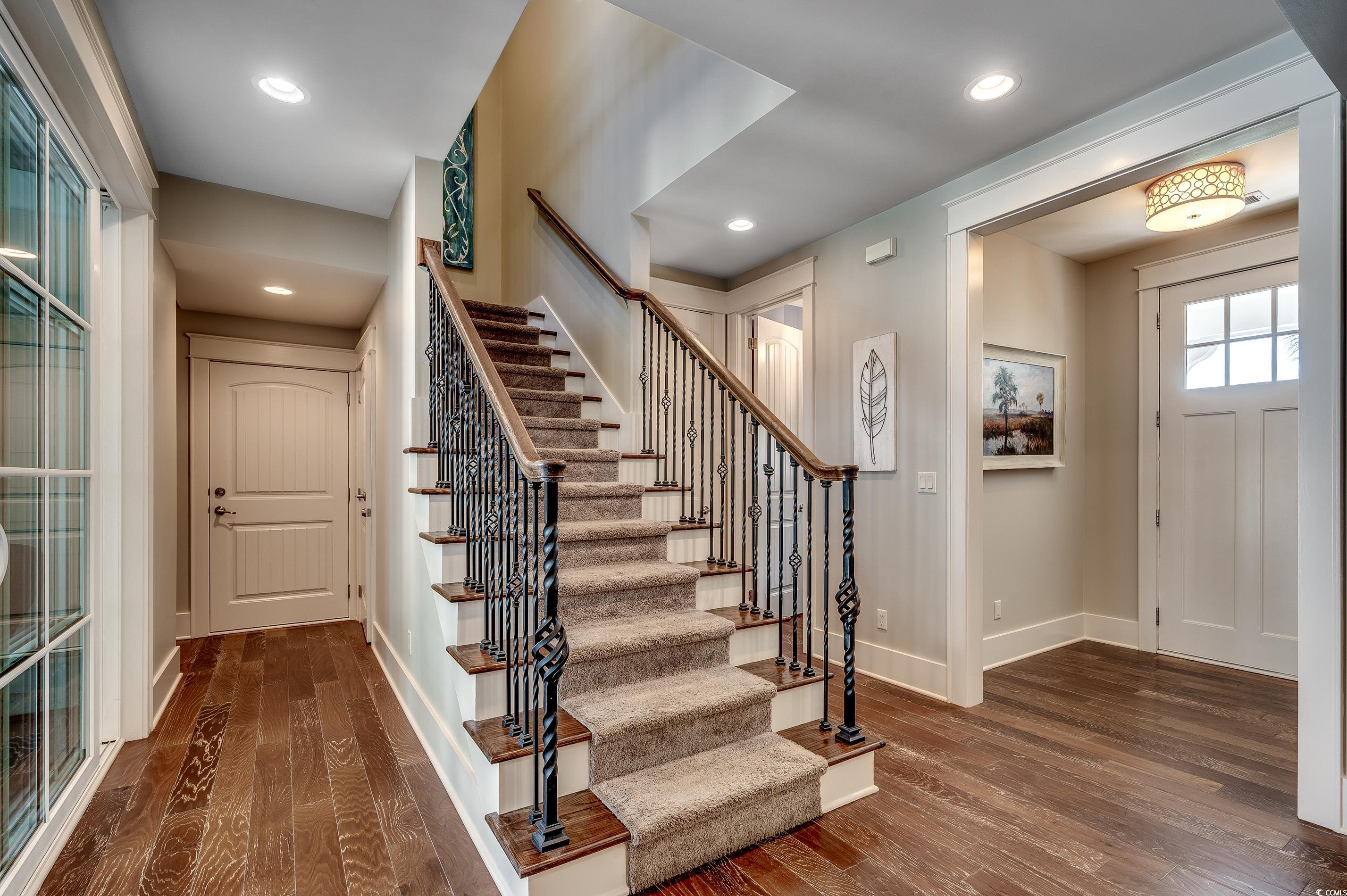4964 Salt Creek Court North Myrtle Beach, SC 29582 - Photo 27 of 35 Entrance foyer featuring baseboards, hardwood / wood-style floors, stairs, and recessed lighting
