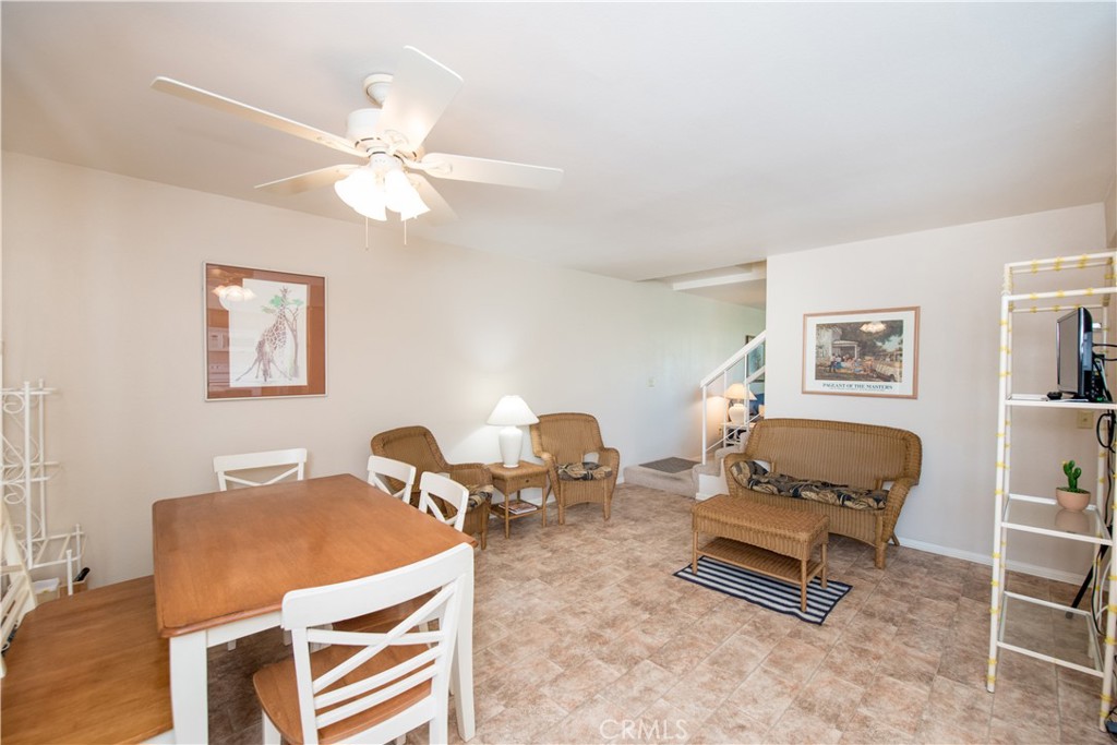 6087 Montecito Circle, Unit 4 Palm Springs, CA 92264 - Photo 11 of 45 a living room with furniture
