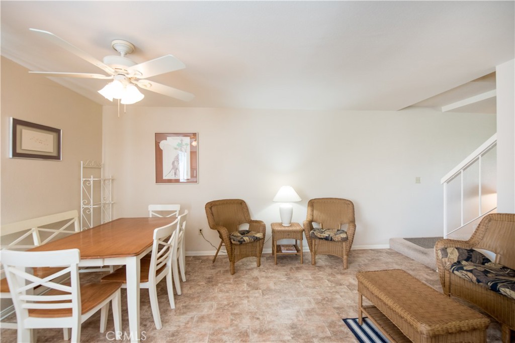 6087 Montecito Circle, Unit 4 Palm Springs, CA 92264 - Photo 12 of 45 a dining room with furniture and window