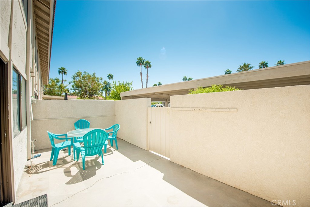 6087 Montecito Circle, Unit 4 Palm Springs, CA 92264 - Photo 30 of 45 a view of kitchen with furniture and refrigerator