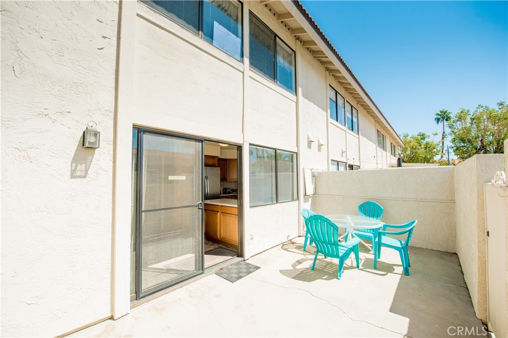6087 Montecito Circle, Unit 4 Palm Springs, CA 92264 - Photo 31 of 45 a view of an outdoor seating area