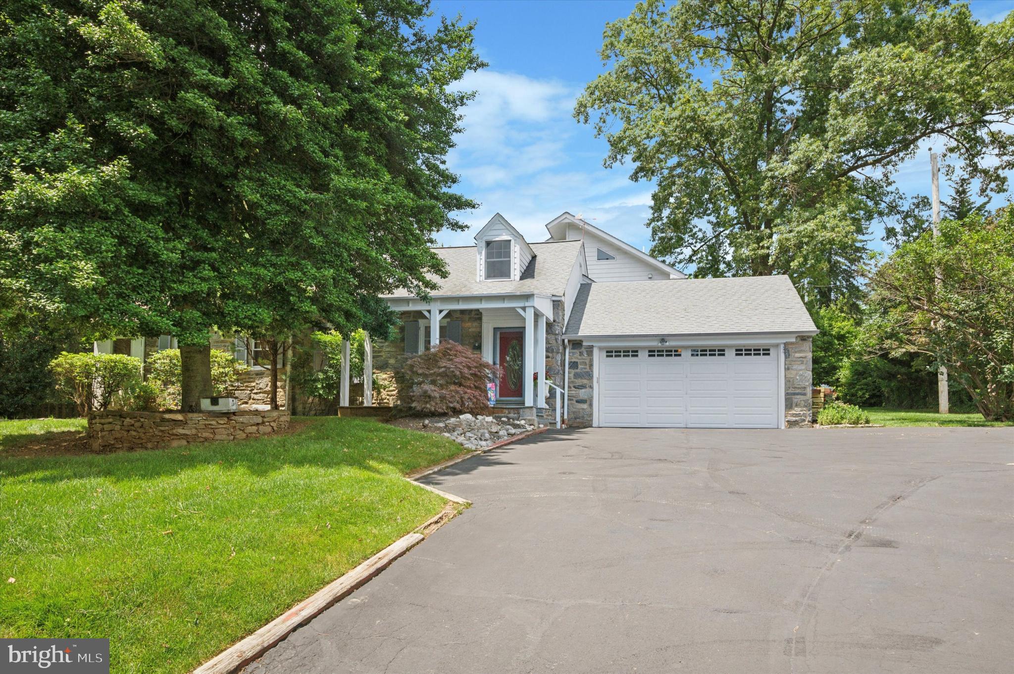 2440 Walton Road Huntingdon Valley, PA 19006 - Photo 1 of 47 a view of a house with a yard and tree s