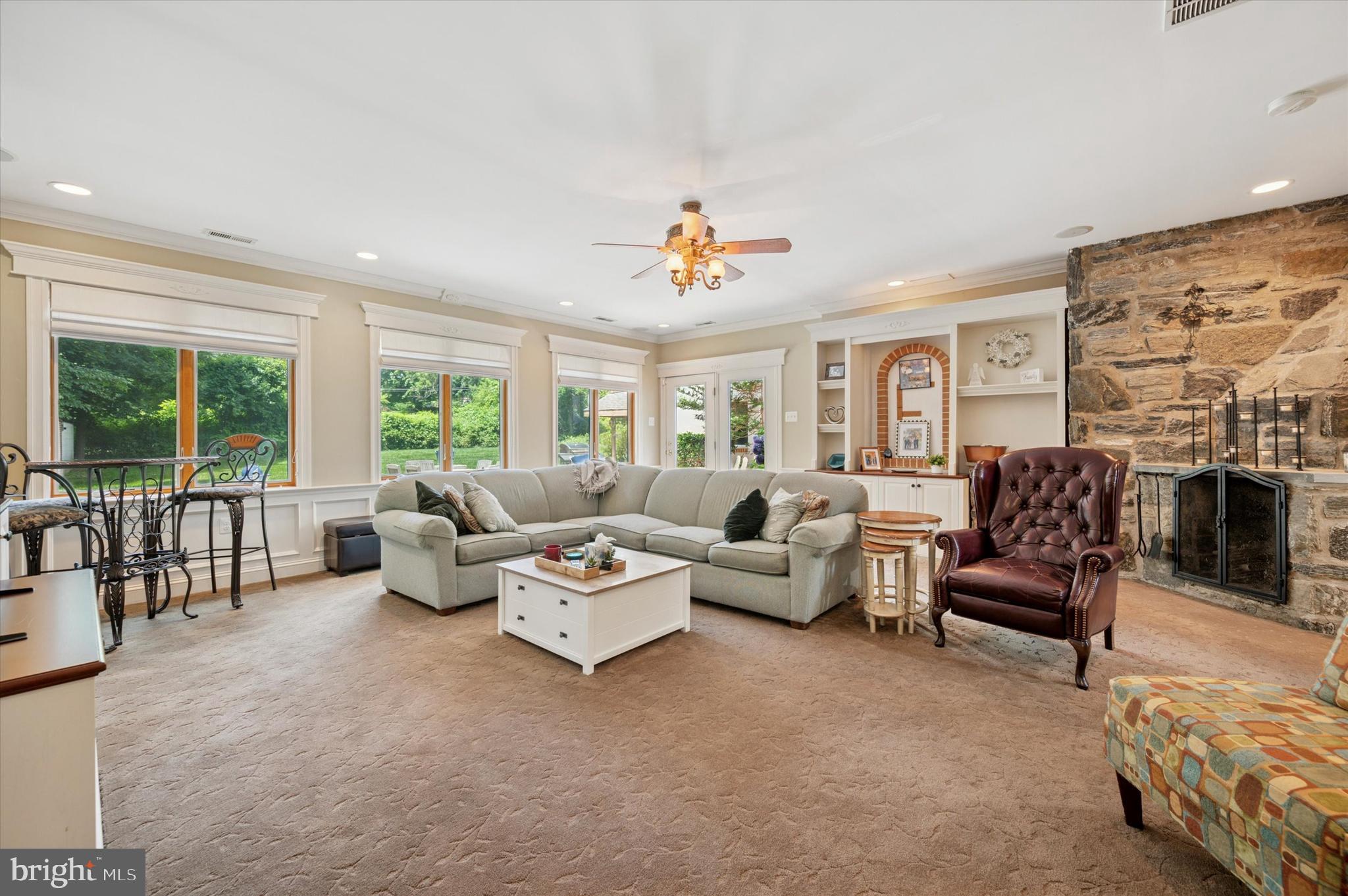 2440 Walton Road Huntingdon Valley, PA 19006 - Photo 17 of 47 a living room with furniture and a large window