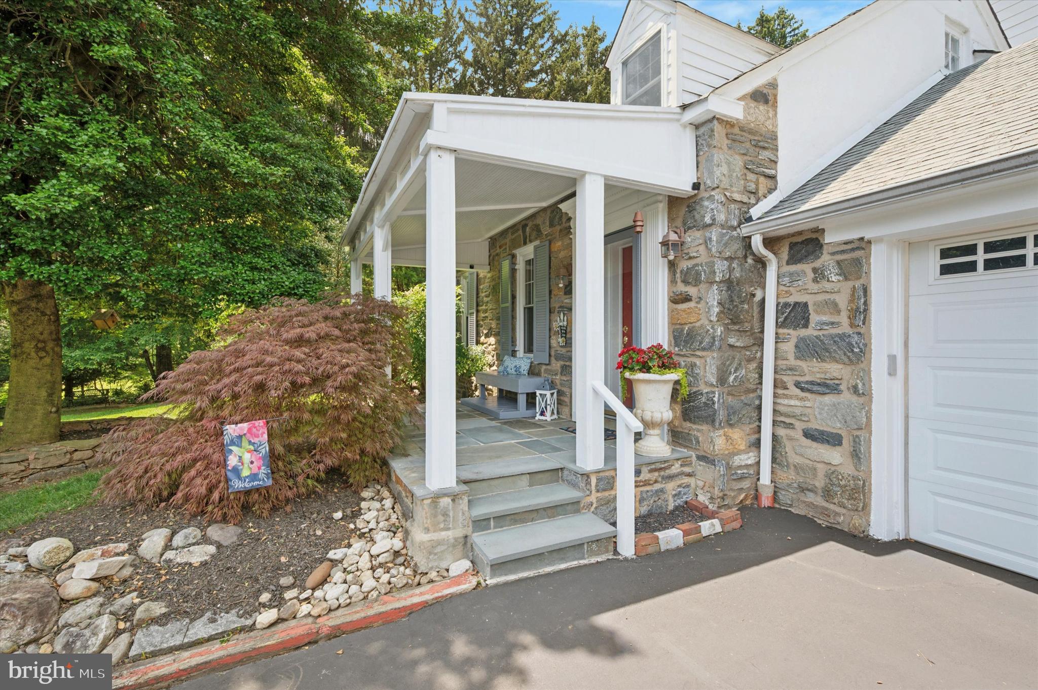 2440 Walton Road Huntingdon Valley, PA 19006 - Photo 5 of 47 front view of a house with a porch