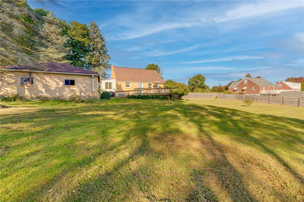2676 Ridge Rd Extension Baden, PA 15005 - Photo 21 of 35 a view of a big yard with plants and large trees