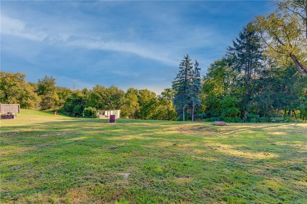 2676 Ridge Rd Extension Baden, PA 15005 - Photo 23 of 35 a big yard with lots of green space and fog
