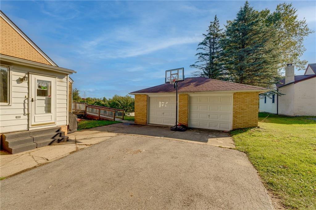 2676 Ridge Rd Extension Baden, PA 15005 - Photo 27 of 35 a view of a house with a backyard and a garage