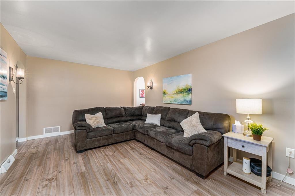 2676 Ridge Rd Extension Baden, PA 15005 - Photo 29 of 35 a living room with furniture and a wooden floor