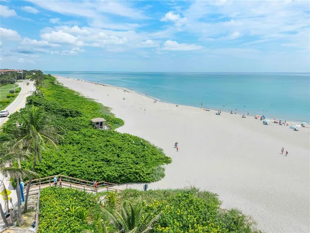 a view of a kitchen with microwave and cabinets