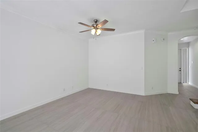 a bathroom with a sink mirror and toilet