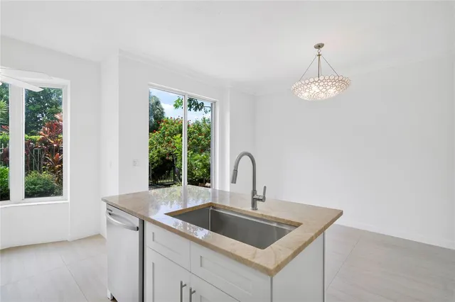 an empty room with a fan