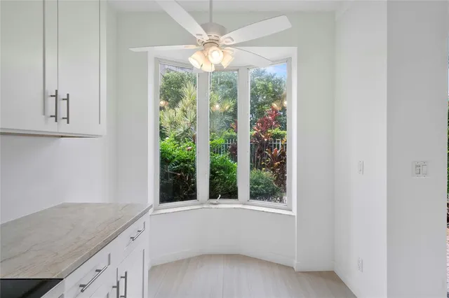 a bathroom with bathtub and shower