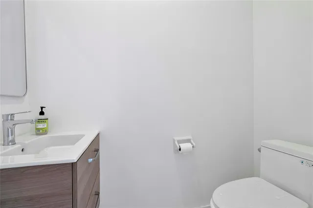 a view of a balcony with wooden floor