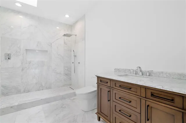 a view of swimming pool with a patio