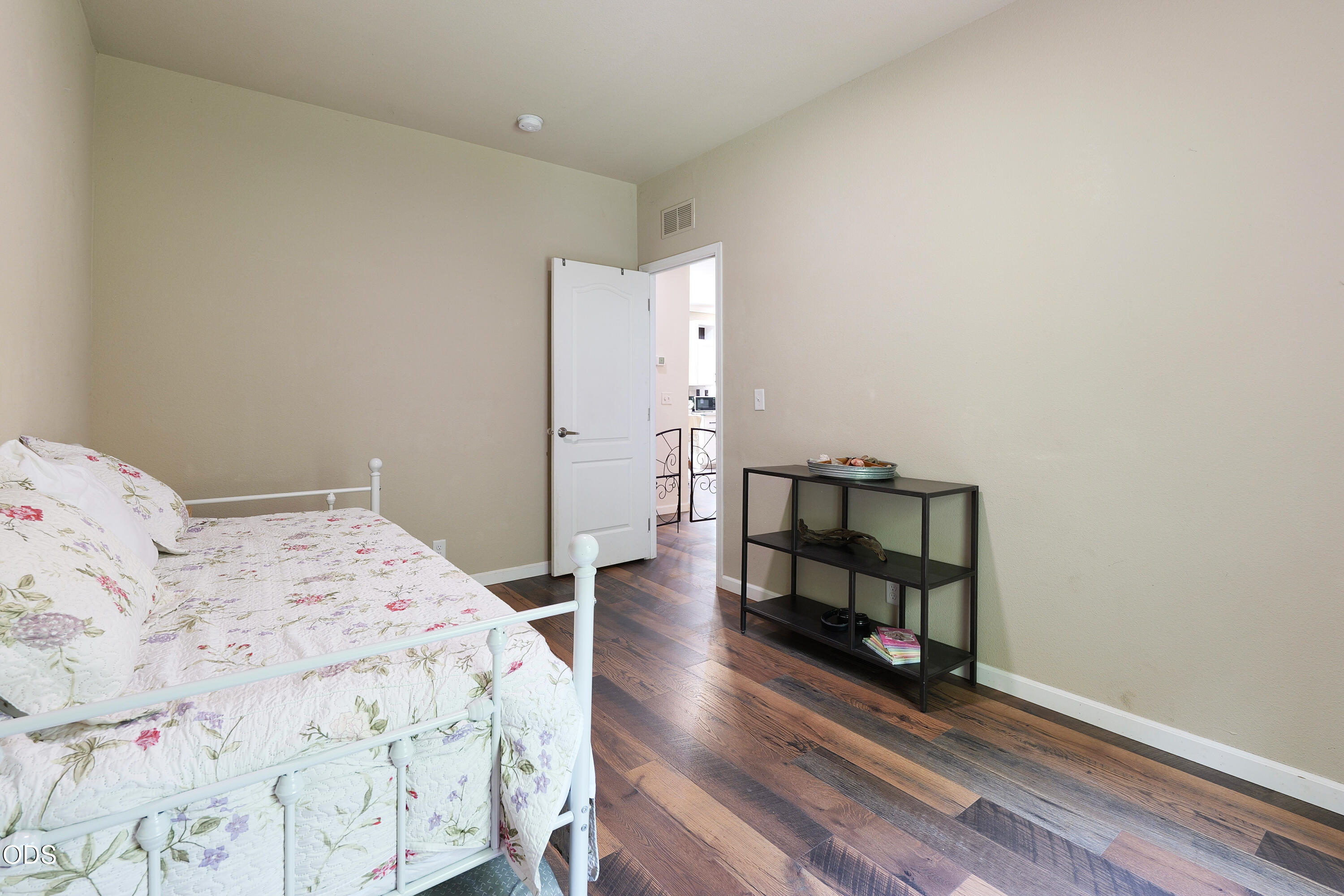 52 Dodes Creek Road Trail, OR 97541 - Photo 53 of 111 a bedroom with a bed a table and wooden floor