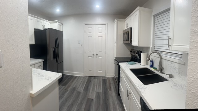 4219 Hirschfield Road Spring, TX 77373 - Photo 11 of 25 This view of the kitchen shows a walk in pantry.