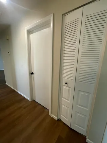 a view of a room that has a window in it