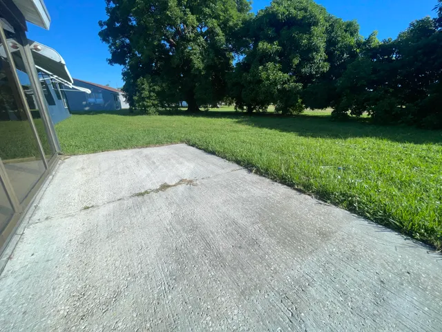 a view of a park and entertaining space