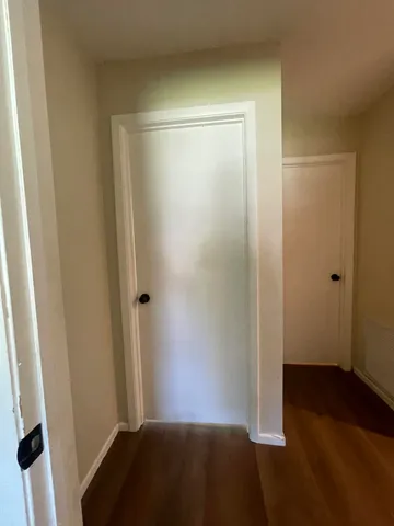 a view of small space with wooden floor