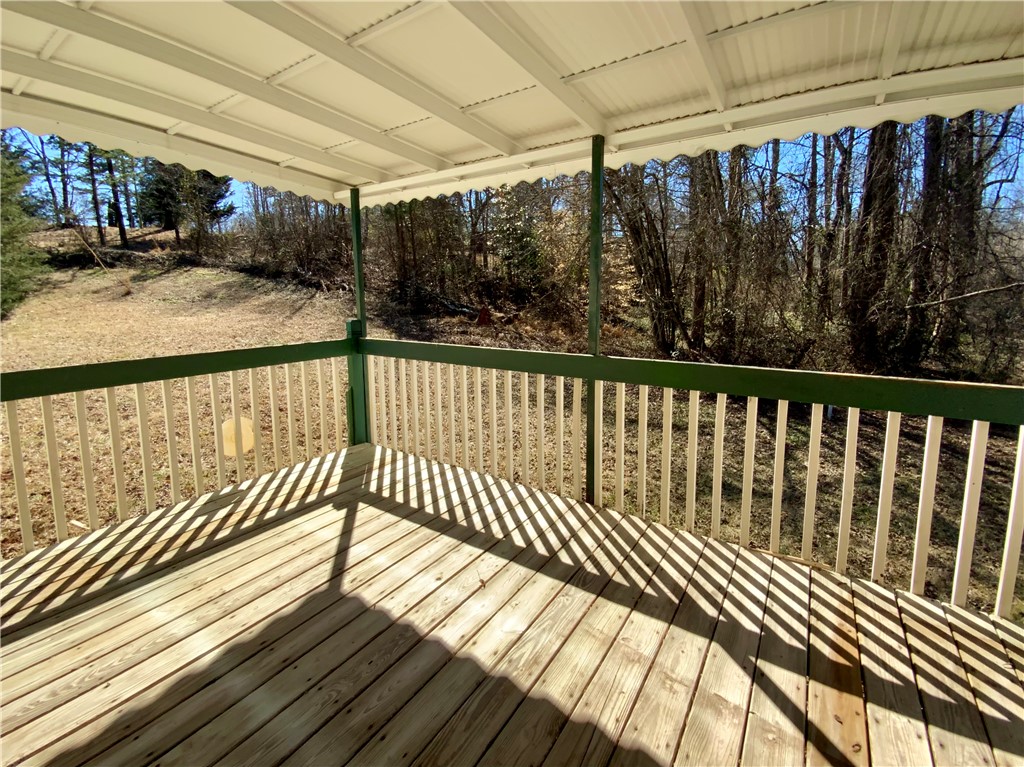 631 Masaw Lane Seneca, SC 29672 - Photo 11 of 32 This spacious deck offers a tranquil retreat with ample room for outdoor enjoyment.