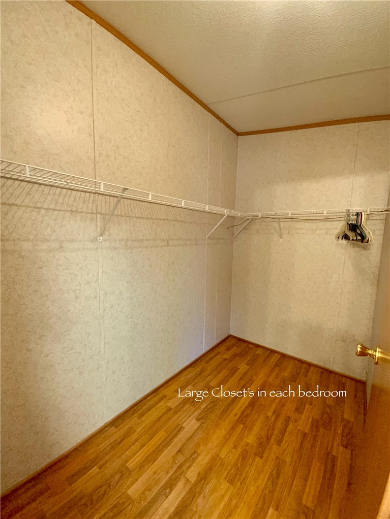 631 Masaw Lane Seneca, SC 29672 - Photo 17 of 32 This spacious closet offers ample storage and features attractive flooring.