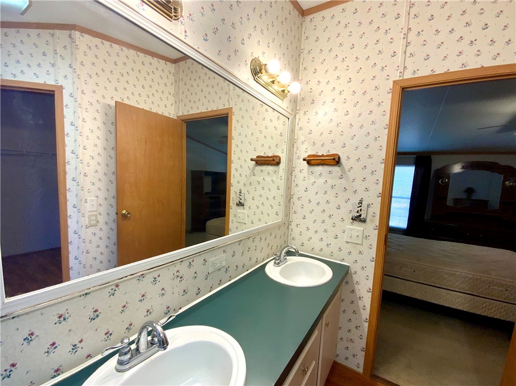 631 Masaw Lane Seneca, SC 29672 - Photo 19 of 32 This functional bathroom features a spacious vanity with dual sinks, perfect for shared routines.