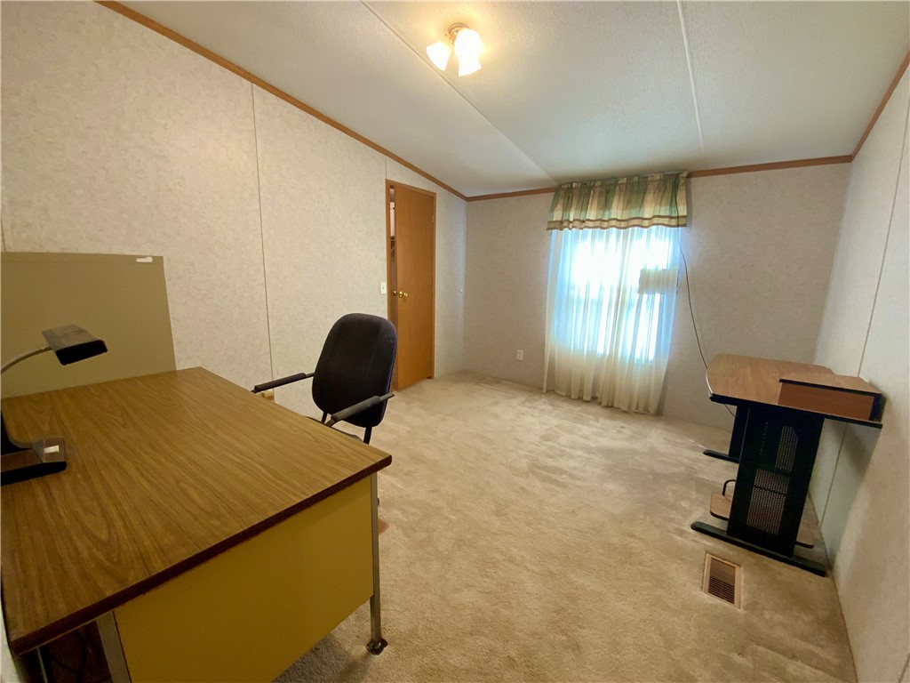 631 Masaw Lane Seneca, SC 29672 - Photo 21 of 32 This versatile room offers an ideal space for a home office or a comfortable study area.