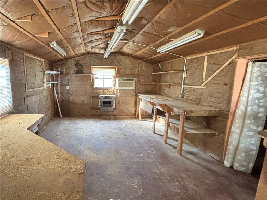 631 Masaw Lane Seneca, SC 29672 - Photo 29 of 32 This spacious workshop offers ample space and features for all your projects and storage needs.