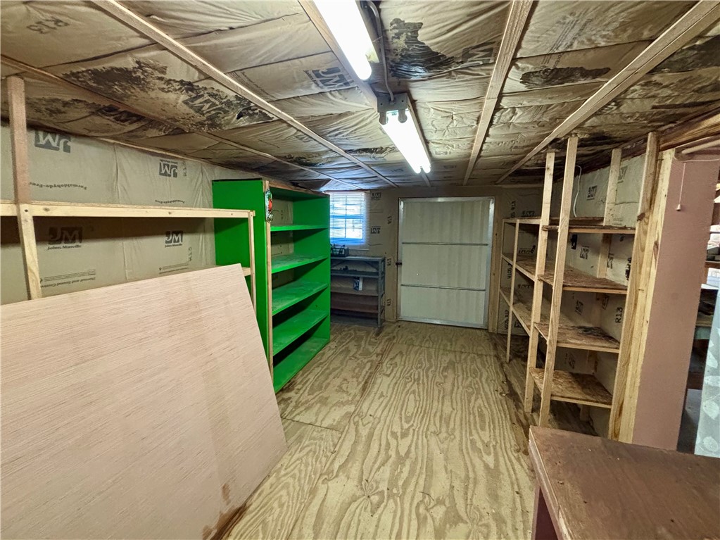 631 Masaw Lane Seneca, SC 29672 - Photo 30 of 32 This versatile space offers ample storage with convenient shelving and a functional layout.