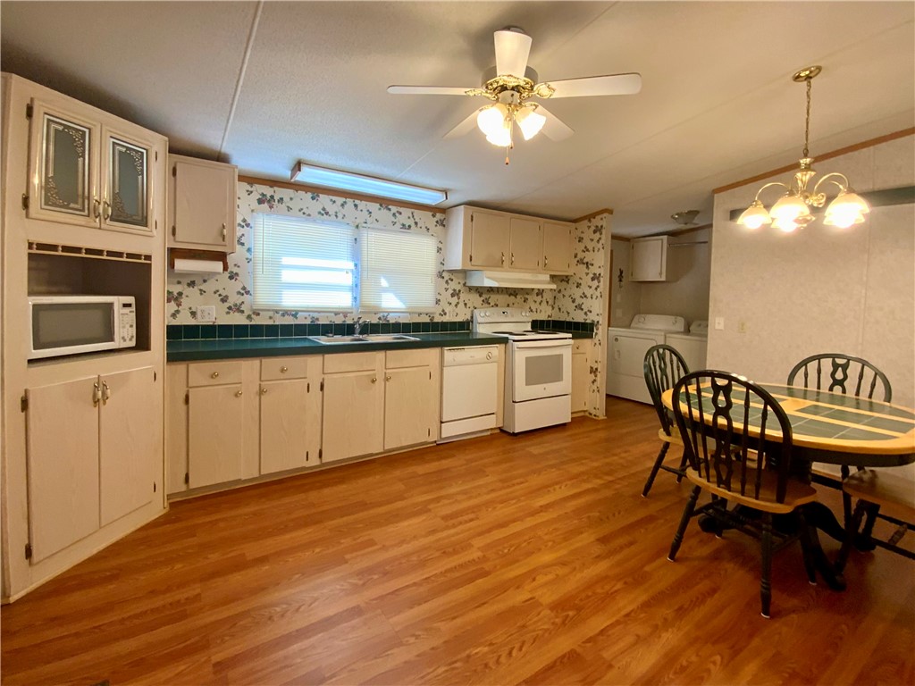 631 Masaw Lane Seneca, SC 29672 - Photo 8 of 32 This spacious kitchen offers a functional layout and ample room for dining.